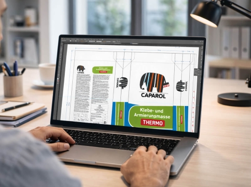 Arculattervezés és grafikai tervezés folyamata laptopon, Caparol csomagolás design és nyomdai anyag szerkesztése Adobe Illustratorban modern munkakörnyezetben