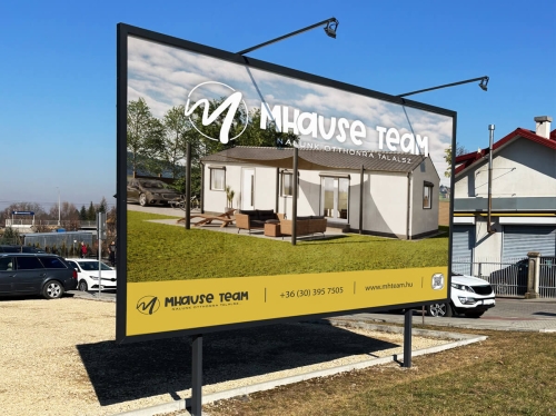 Bevásárlóközpont parkolójába készült óriásplakát grafikai tervezés