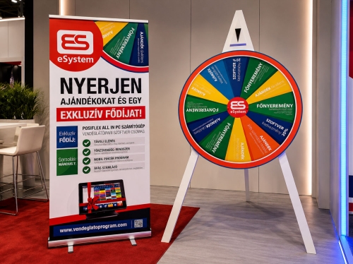 eSystem nyereménykerék és roll-up grafikai tervezése kiállítási arculati megjelenéshez